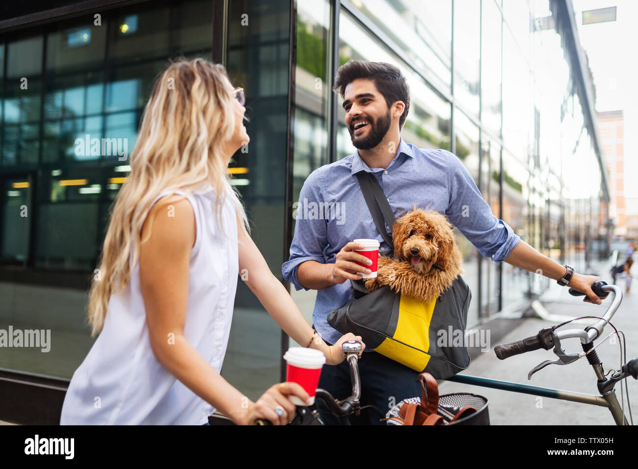 Couple in love with dog walking and smiling outdoor Stock Photo - Alamy