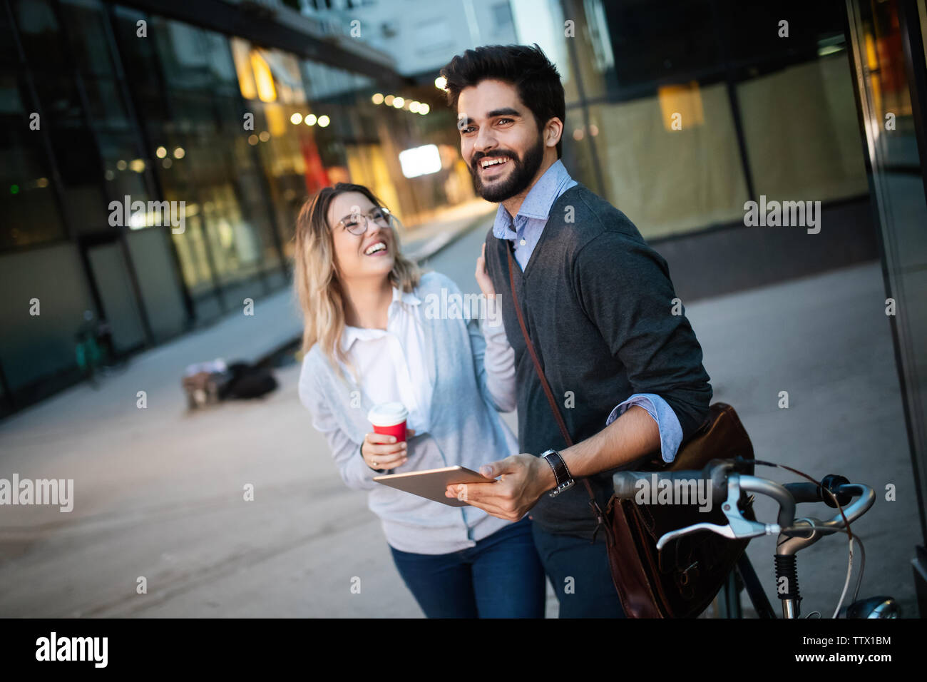 Happy young couple using a digital tablet together and smiling Stock ...