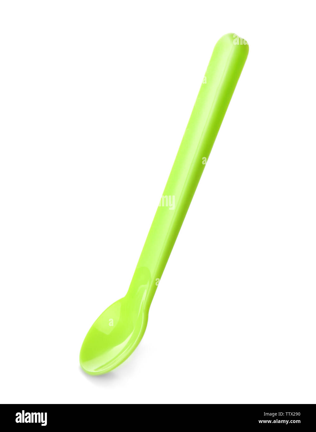 Bright plastic spoon for child on white background Stock Photo - Alamy