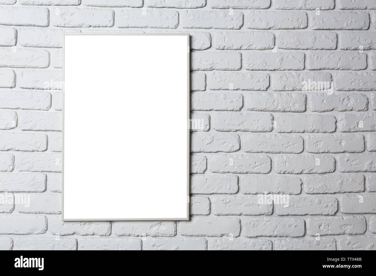 blank black picture frame on the wall Stock Photo - Alamy