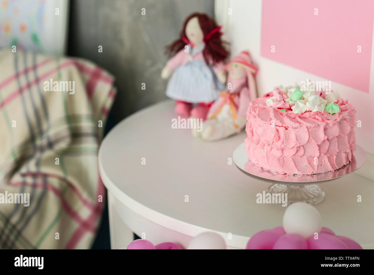 Tasty birthday cake on table in room Stock Photo - Alamy
