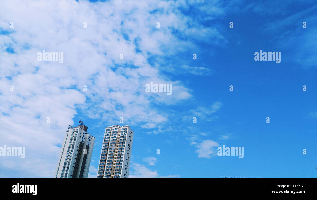 high-rise building under the blue sky Stock Photo - Alamy