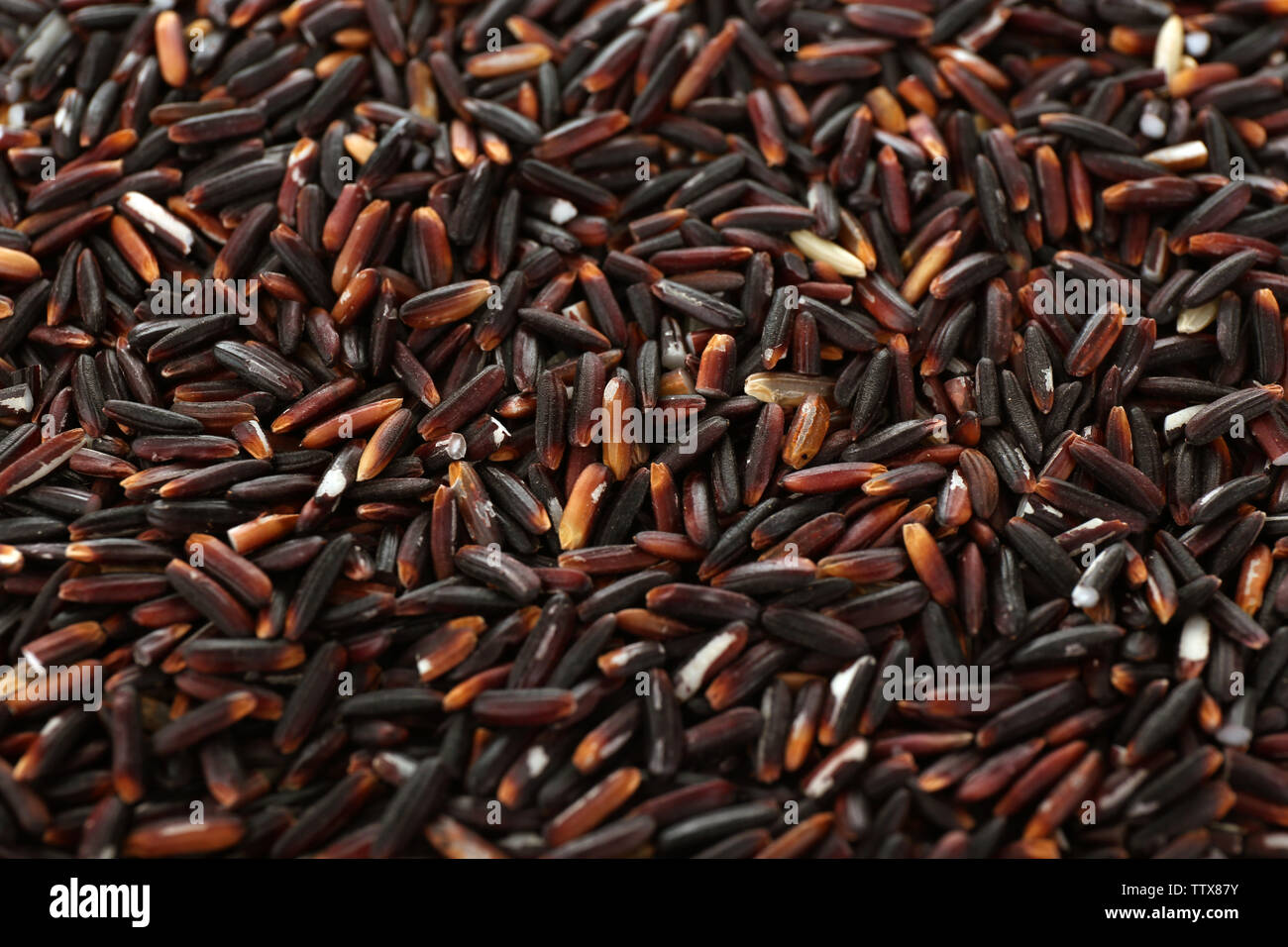 Dark wild rice background Stock Photo - Alamy