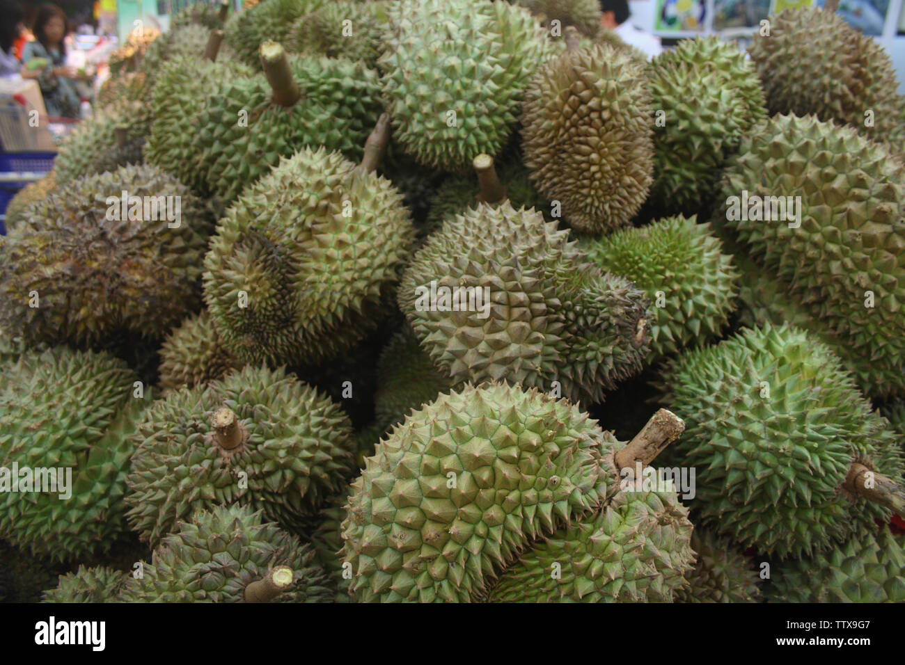 Durian fruits at a market stall, Bangkok, Thailand Stock Photo