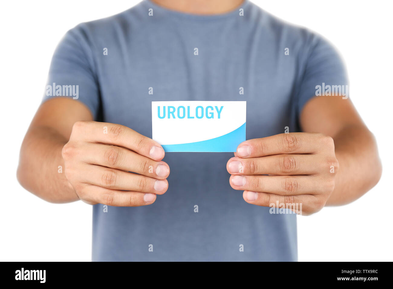 Man holding business card. Urology concept Stock Photo