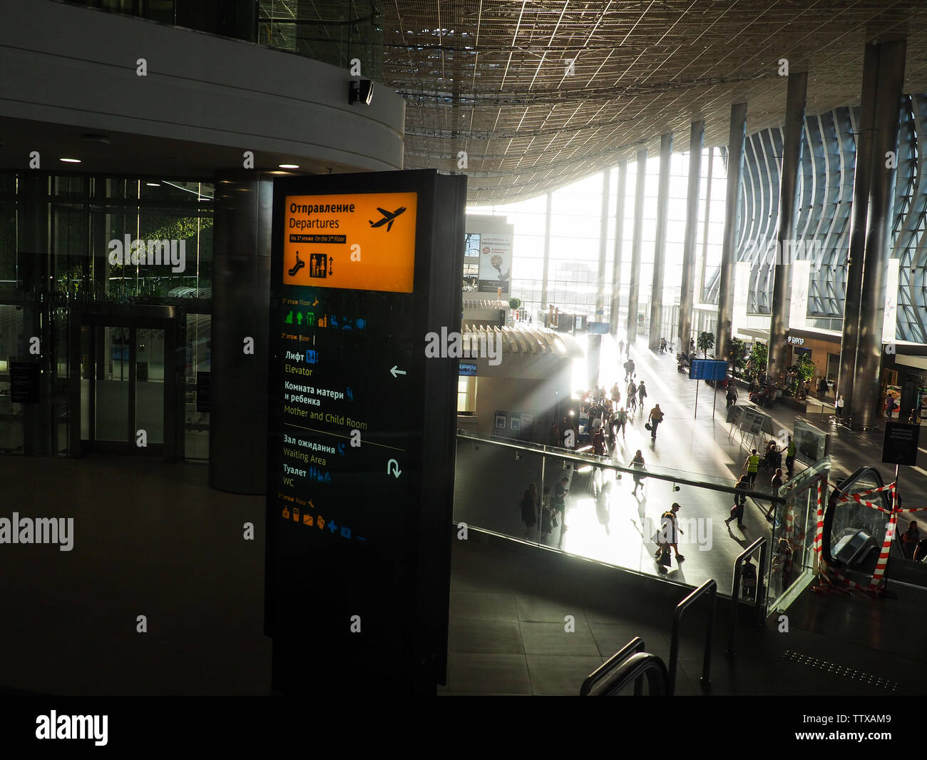 SIMFEROPOL, CRIMEA, RUSSIA - JUNE 15, 2019: The interior of the new modern passenger terminal of the international airport of Simferopol in the sunlig Stock Photo