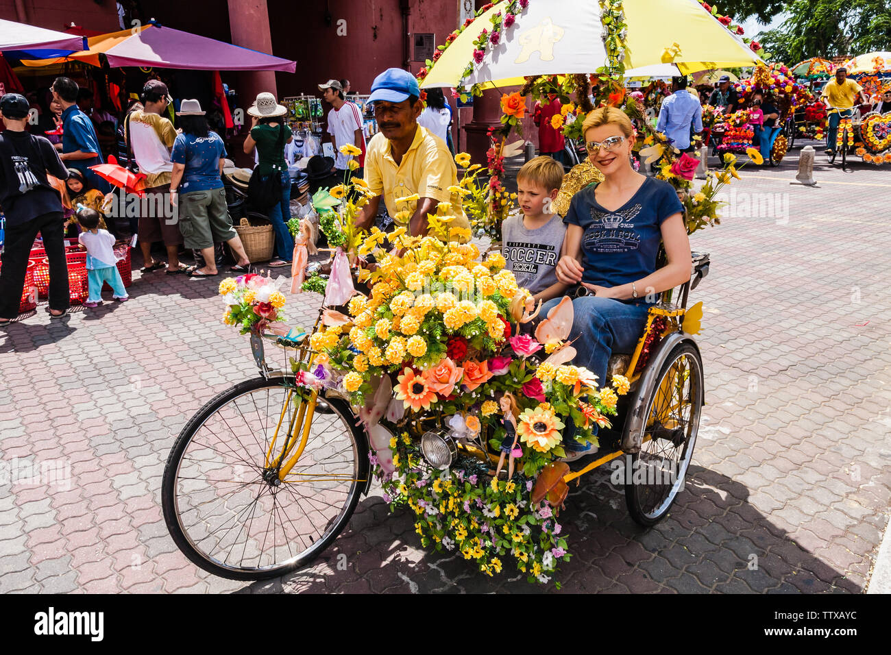 A trishaw serving tourists in Malacca Stock Photo