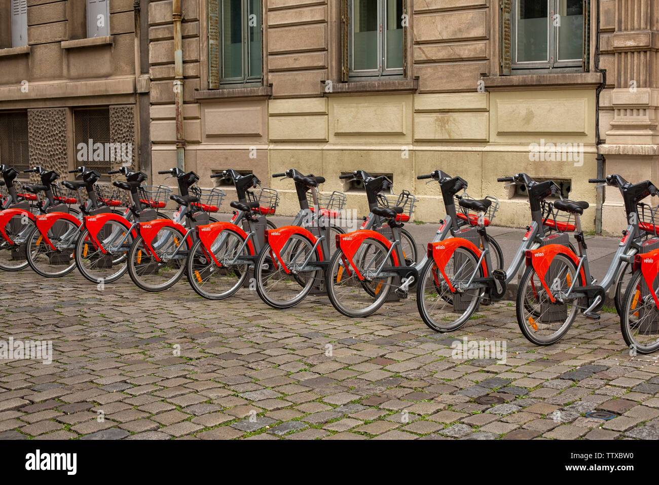 Rent Bikes In A Row On The Street In Lyon France Stock Photo Alamy