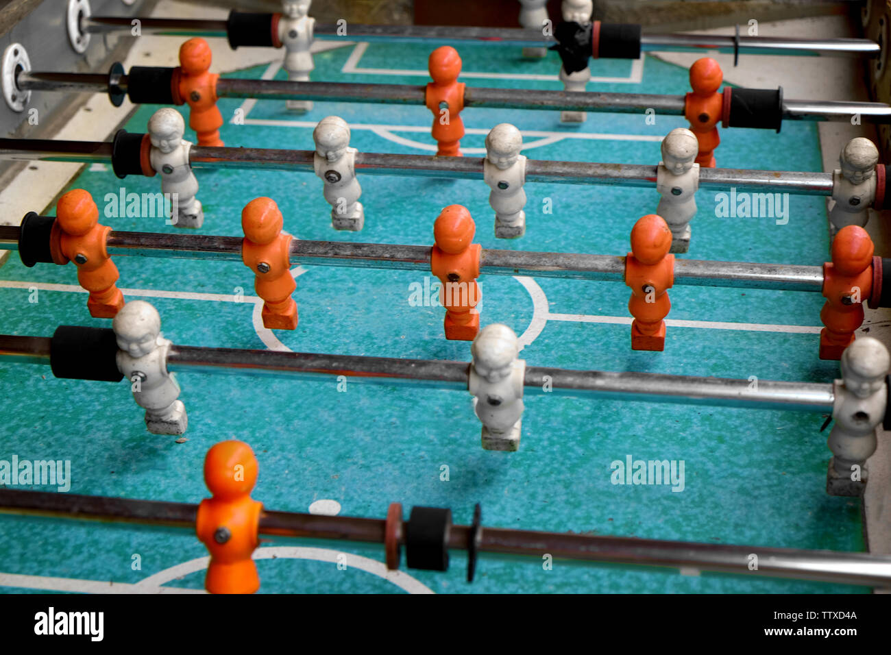 Table soccer game with red and white players Stock Photo Alamy