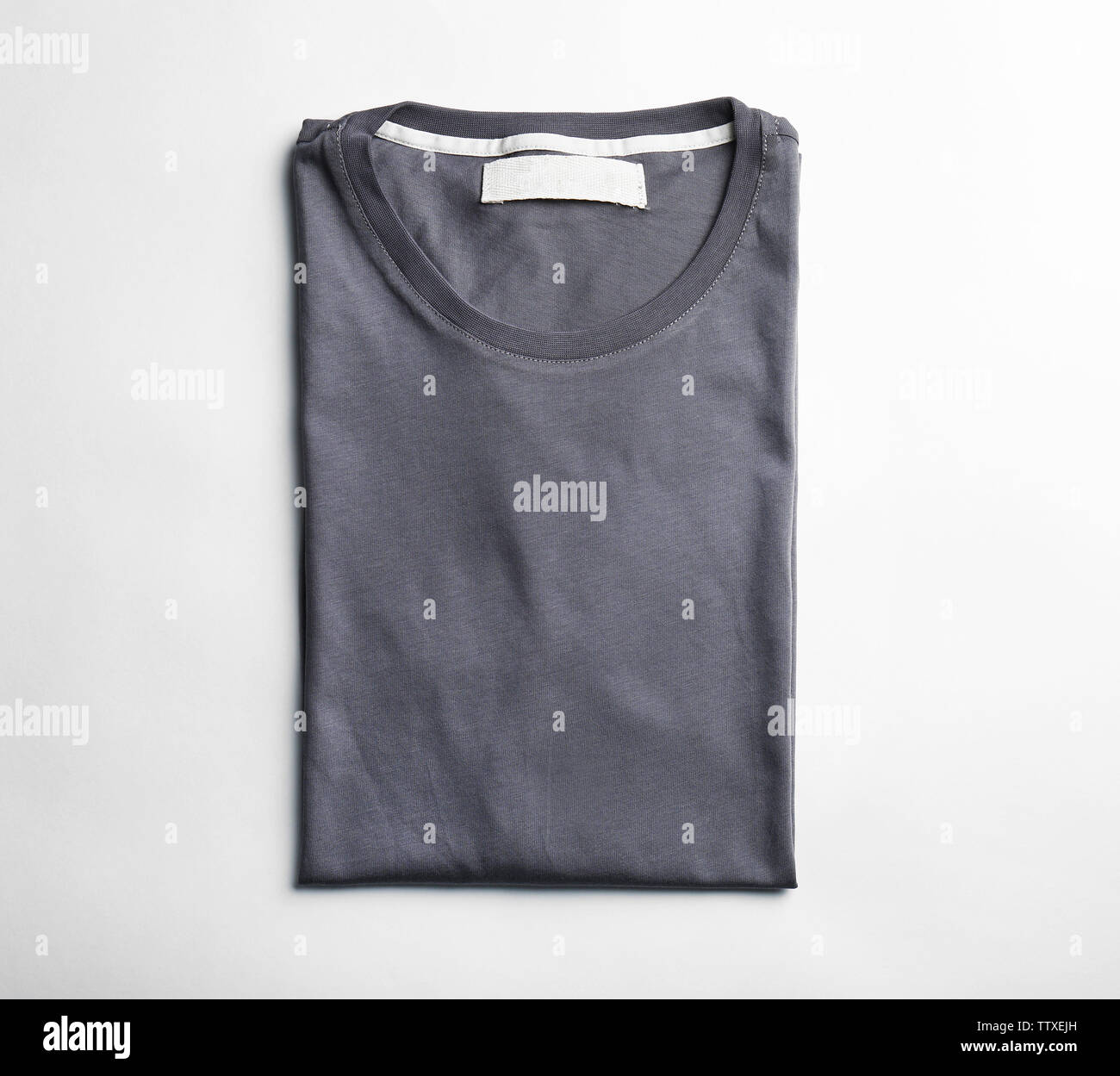 Blank grey t-shirt on white background Stock Photo - Alamy