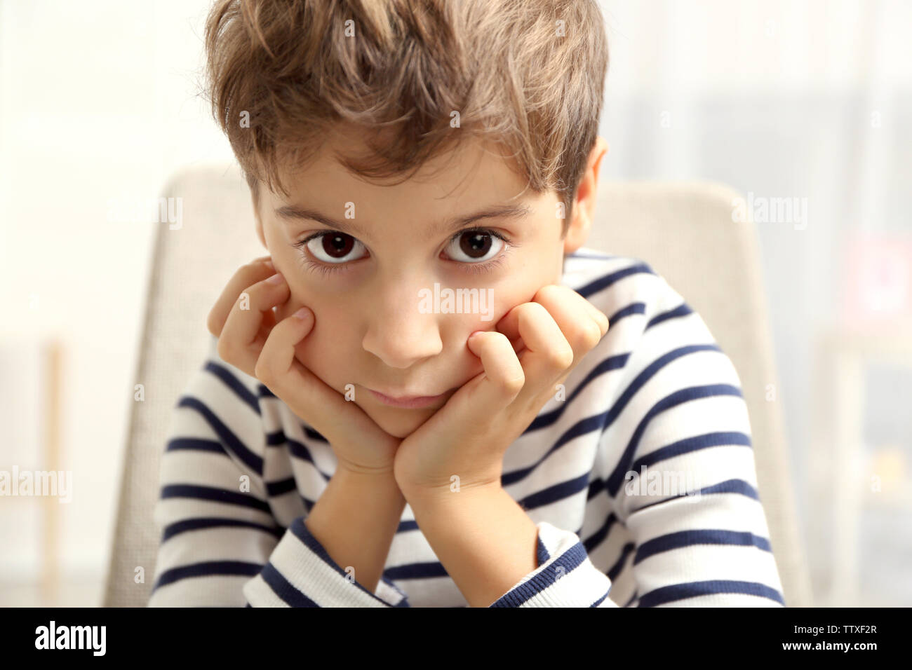 Portrait of cute little boy indoors Stock Photo - Alamy