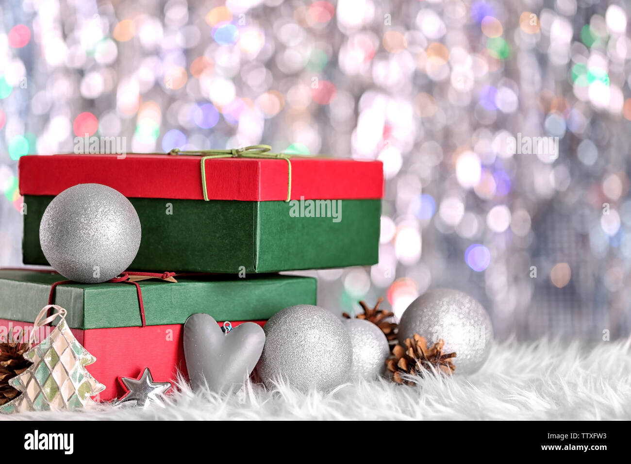 Christmas concept. Gift boxes and decorations on bokeh background Stock ...