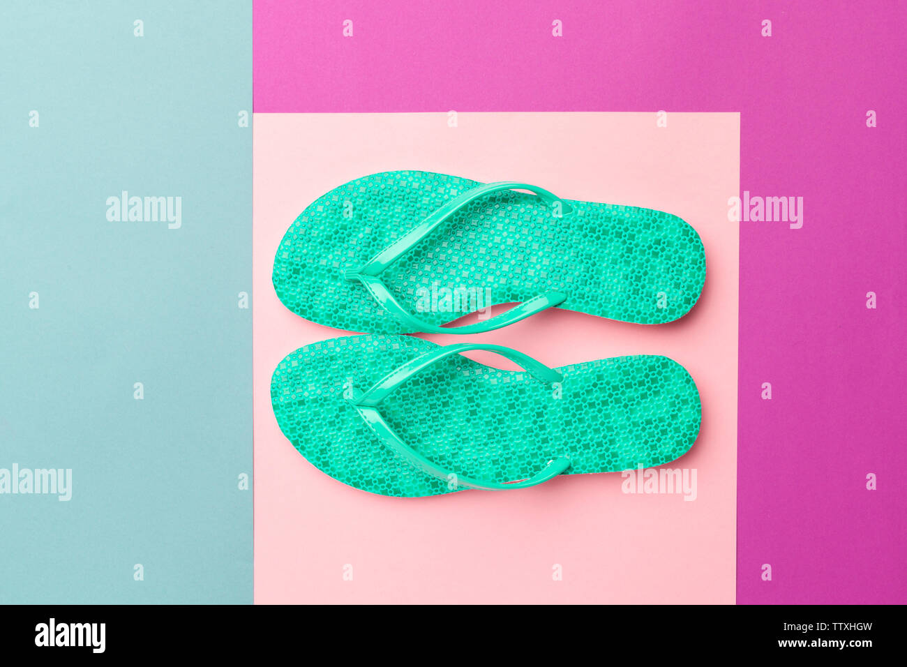Female flip flops on a colorful vibrant background Stock Photo - Alamy