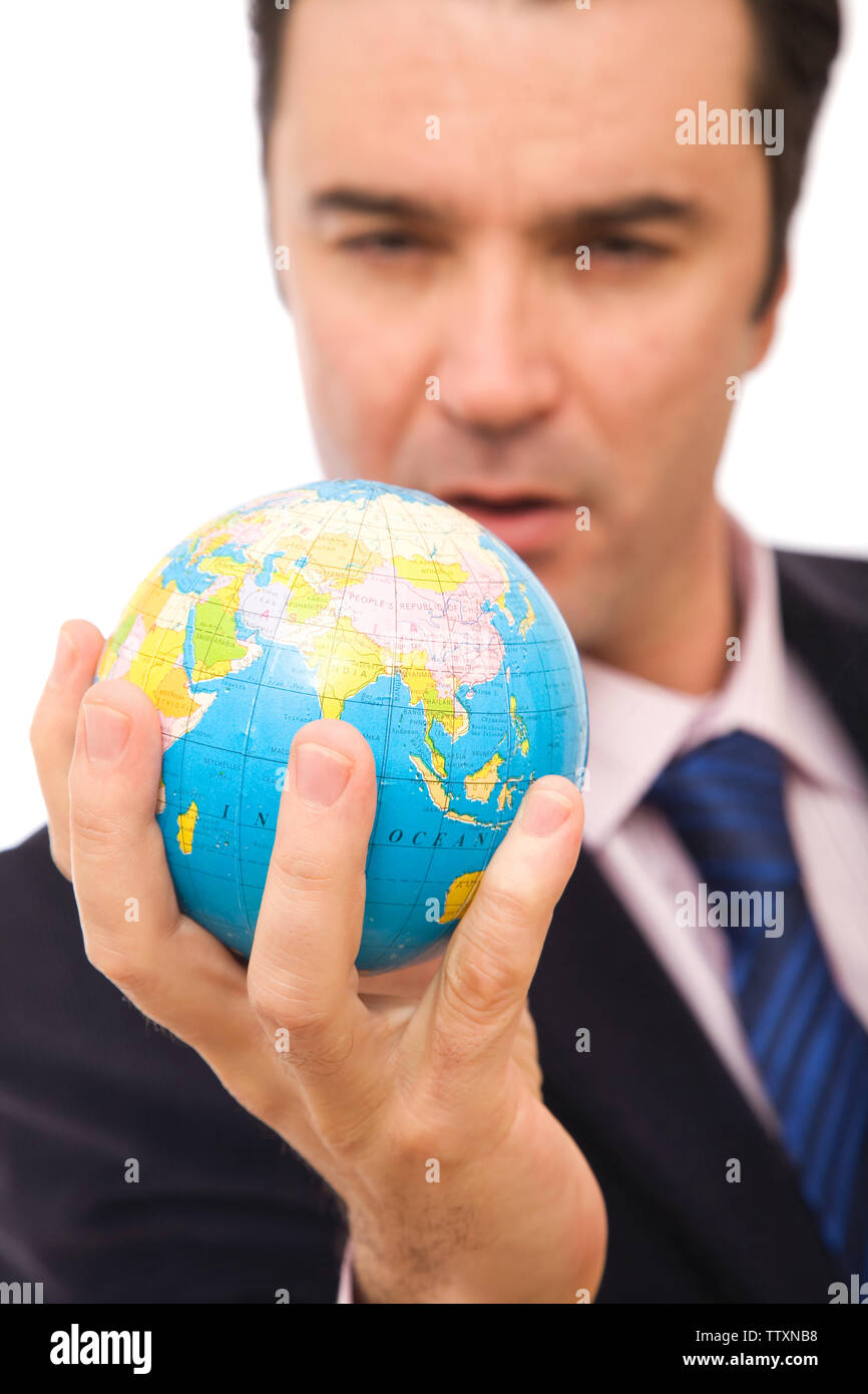 global business concept with a senior businessman holding mini globe ...