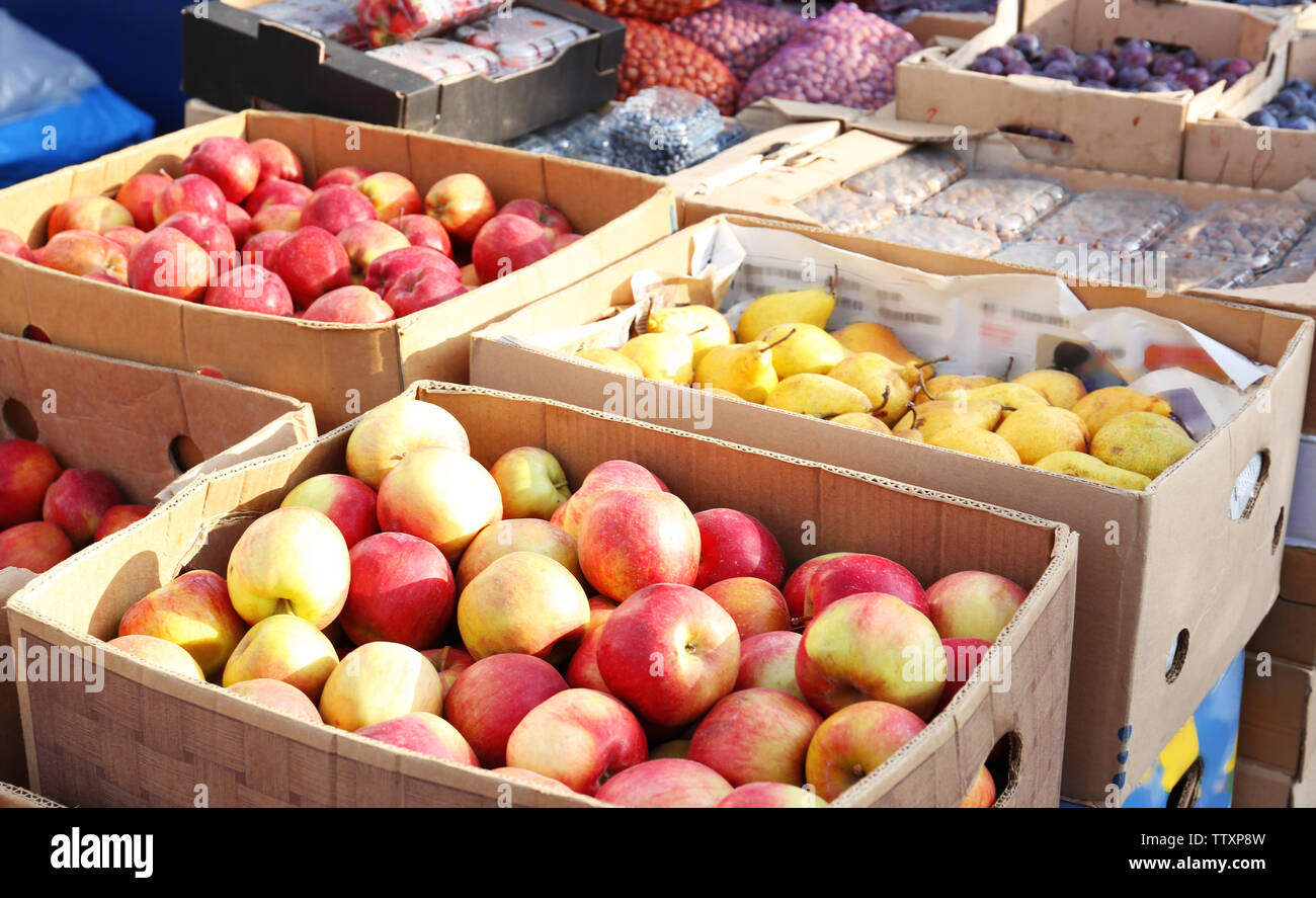 Fresh fruits in cardboard boxes on market Stock Photo - Alamy