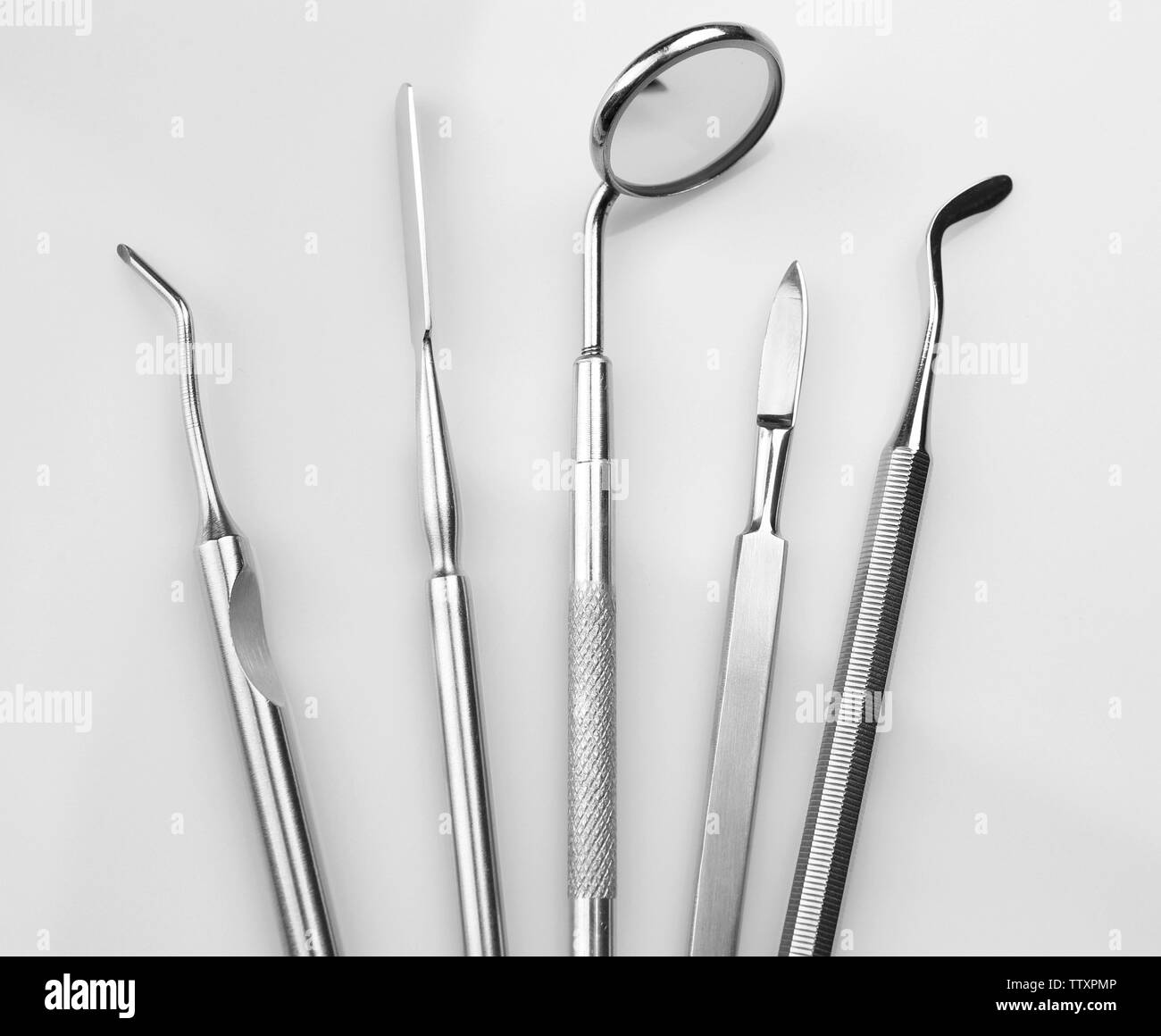 Dentist medical tools on white background Stock Photo Alamy