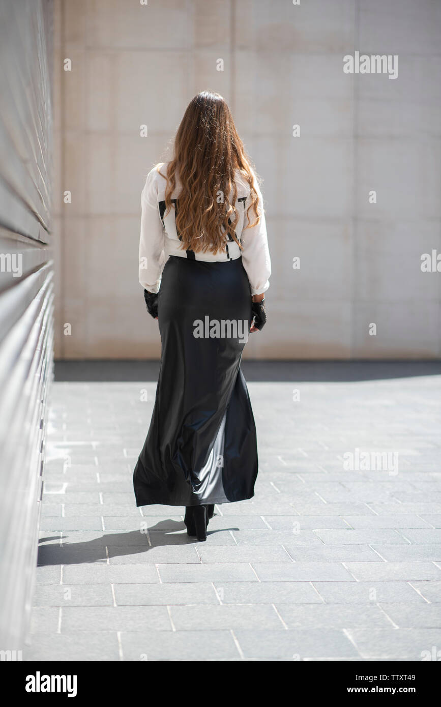 Woman Long Skirt Walking Away High Resolution Stock Photography and ...