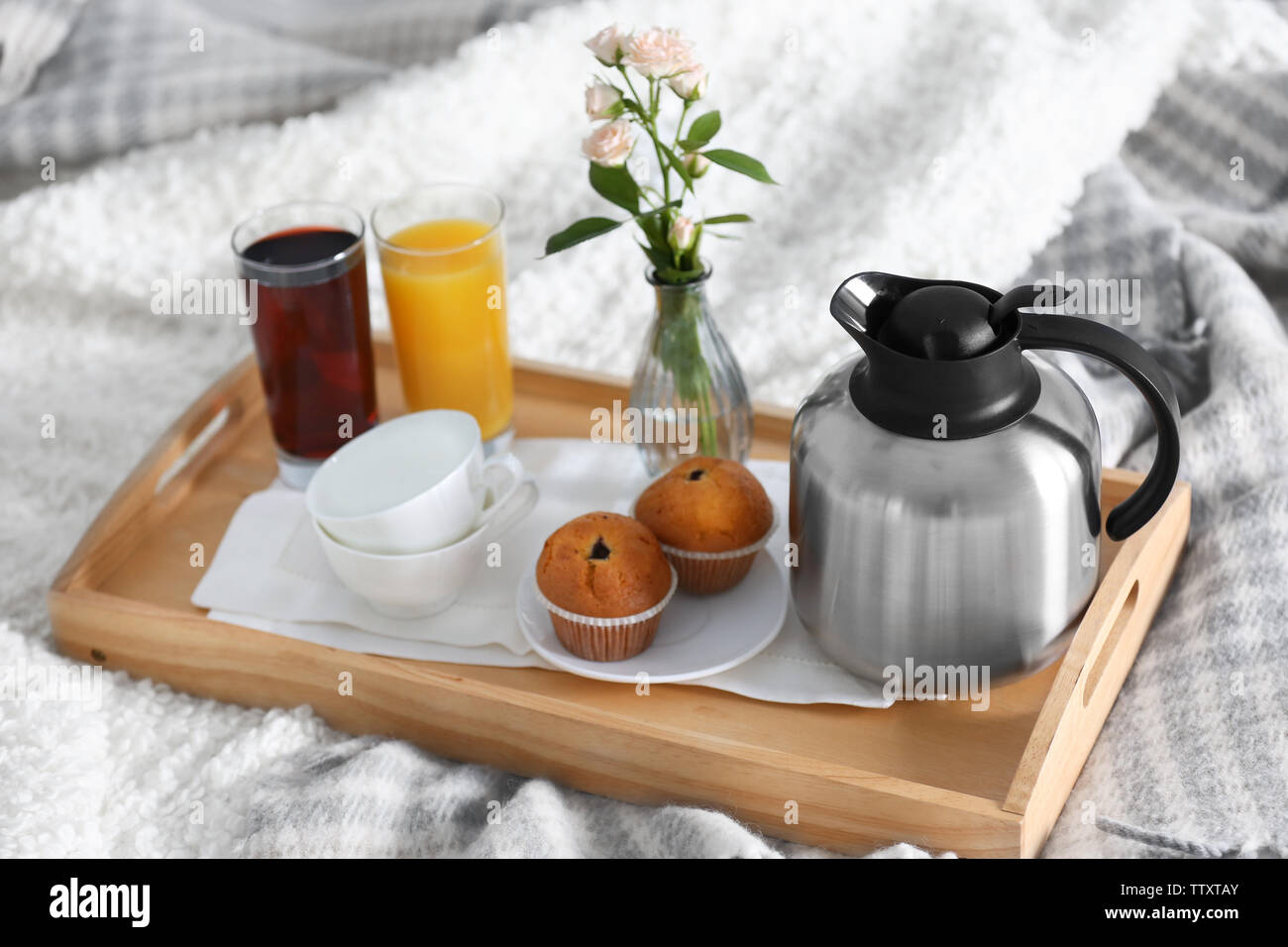 Breakfast in bed. Tray with juice, muffins and coffee Stock Photo Alamy