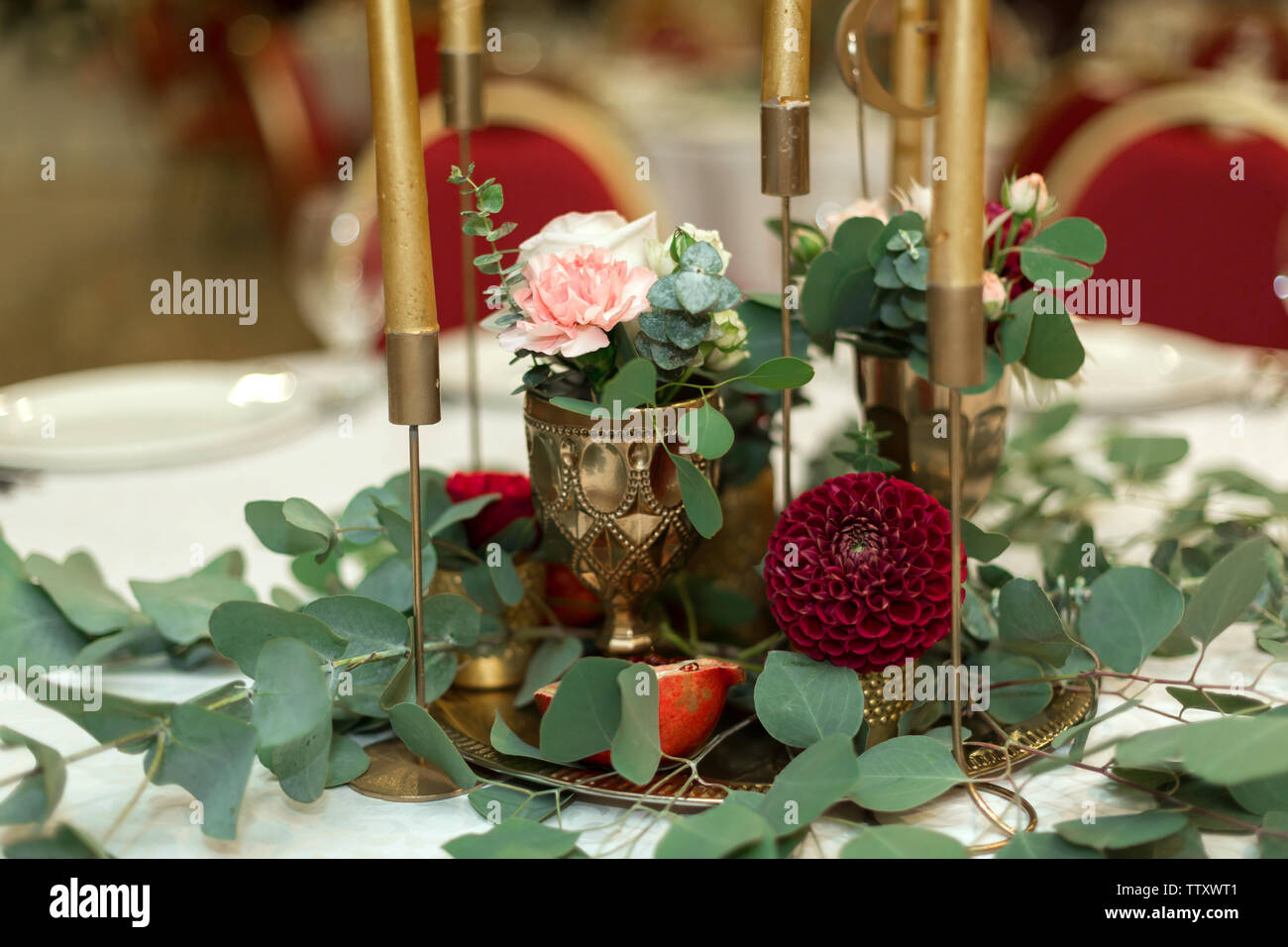 The Wedding Table Setting Is Decorated With Fresh Flowers In A