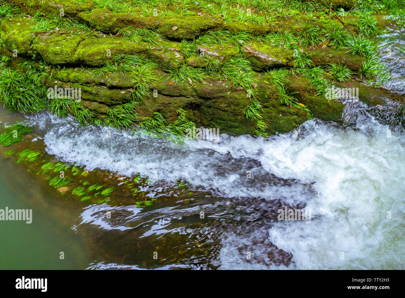 A stream at the seam of the Wulong Long Water Gorge Stock Photo