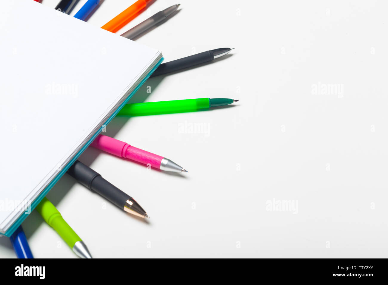 notepad notebook and ball pont pen isolated on white background Stock ...