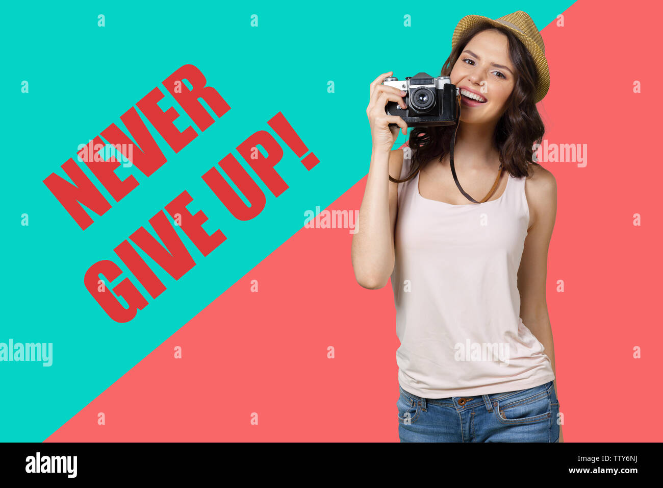 Cheerful female photographer posing for camera Stock Photo - Alamy