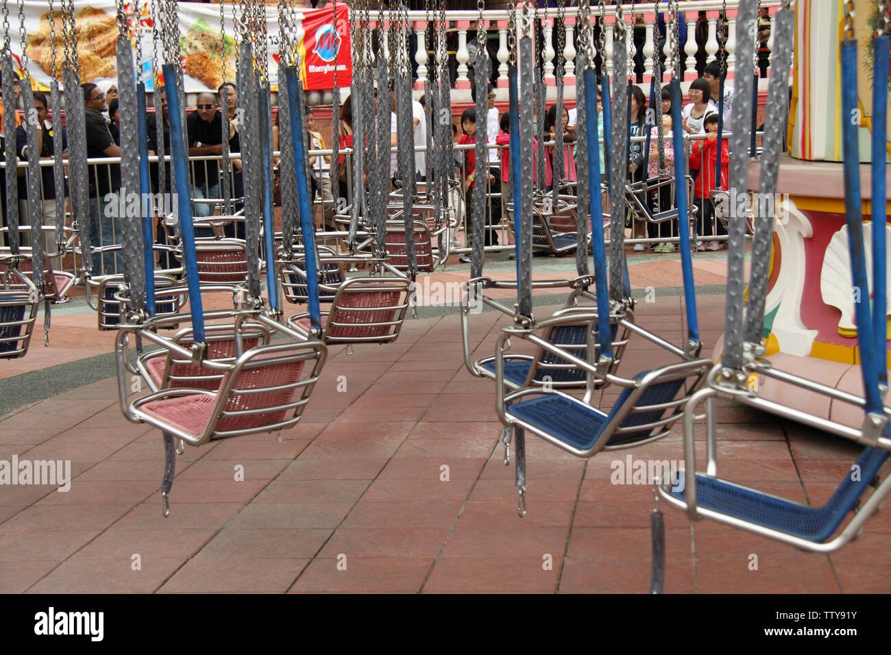 Chain swing ride in an amusement park Stock Photo Alamy