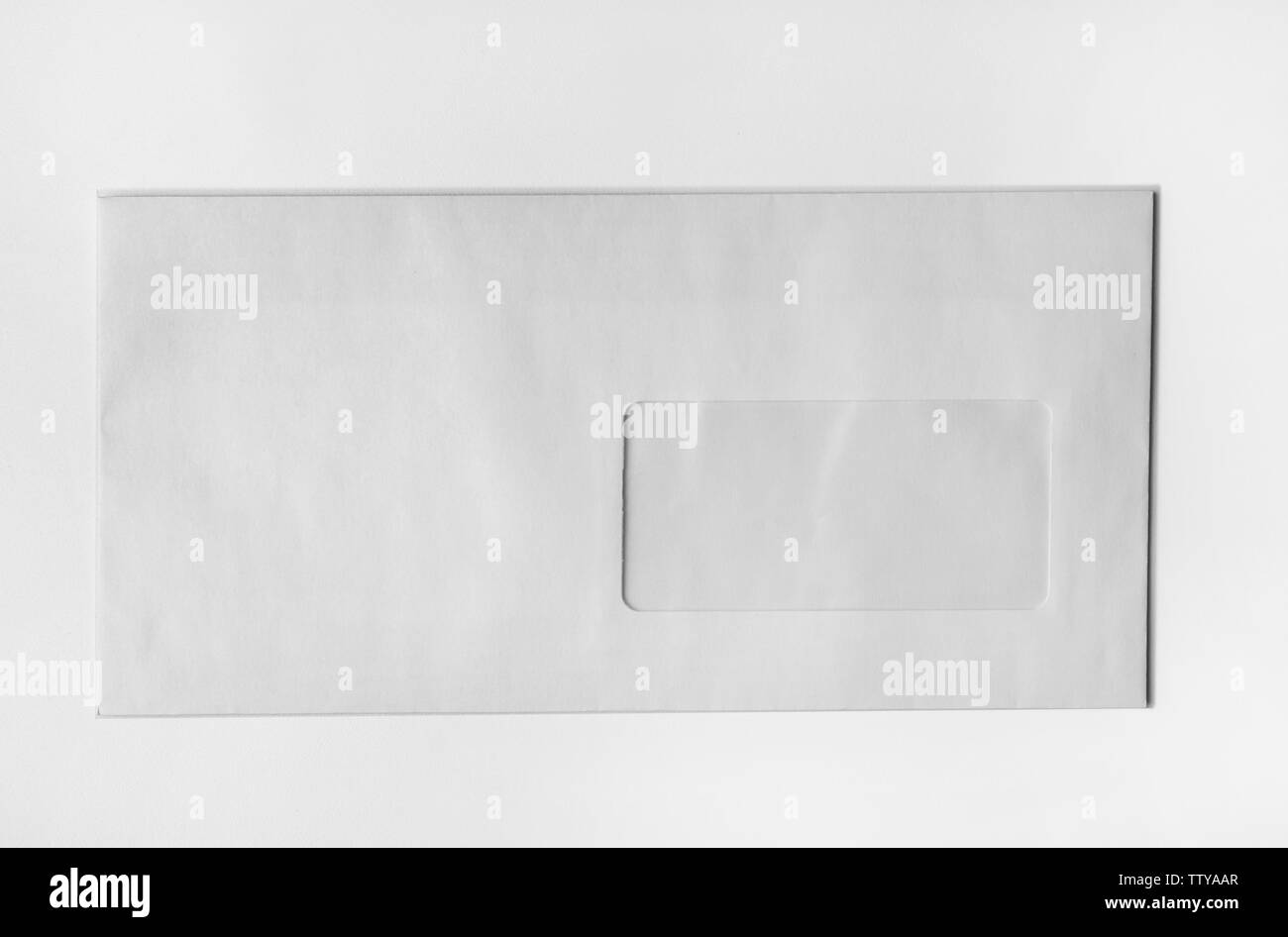 Blank envelope on white background Stock Photo - Alamy
