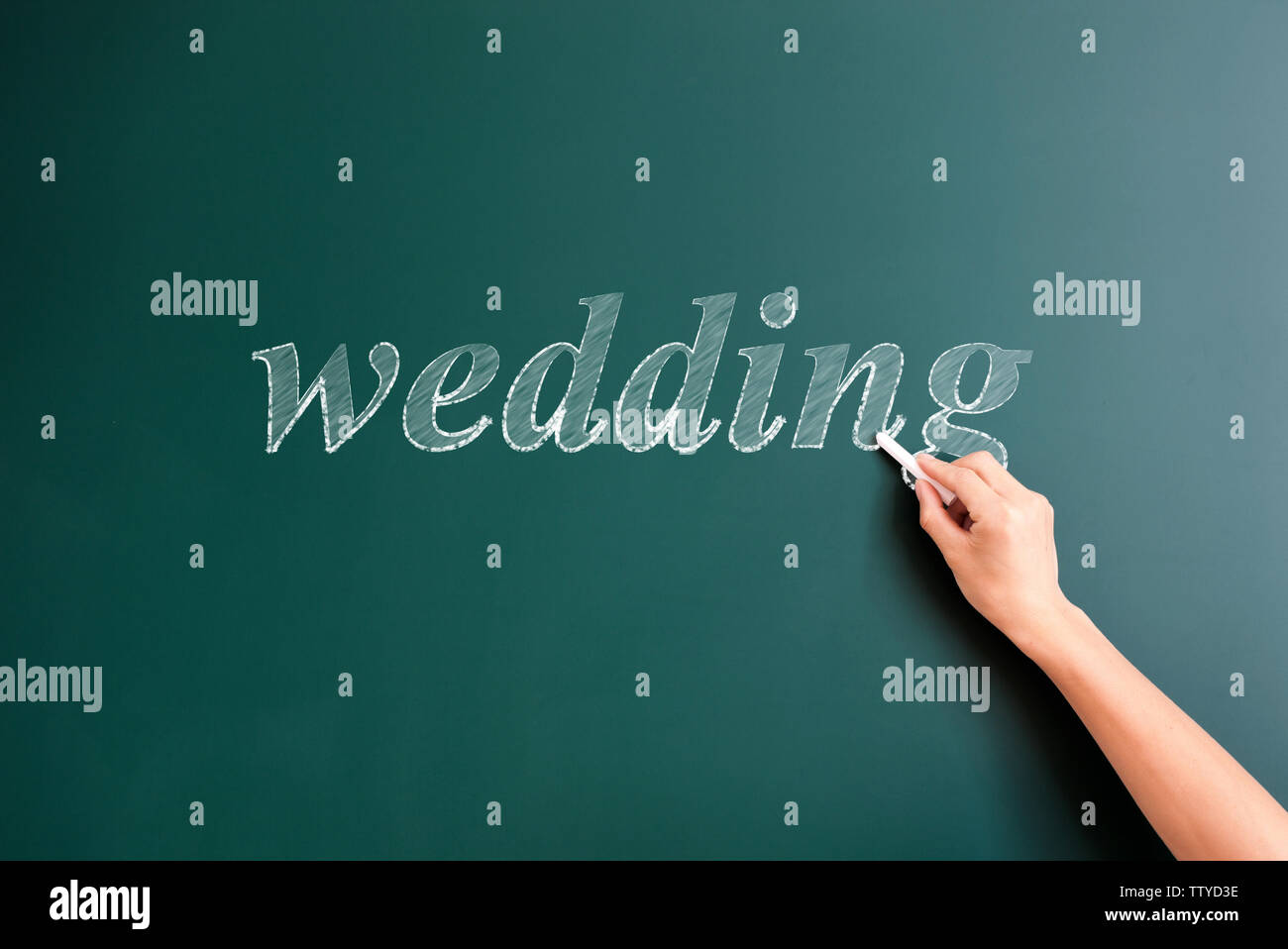 wedding written on blackboard Stock Photo