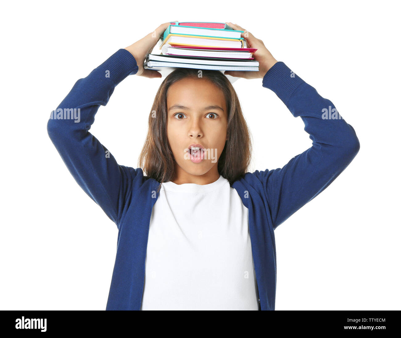 Cute schoolgirl with books and notepads on white background Stock Photo ...