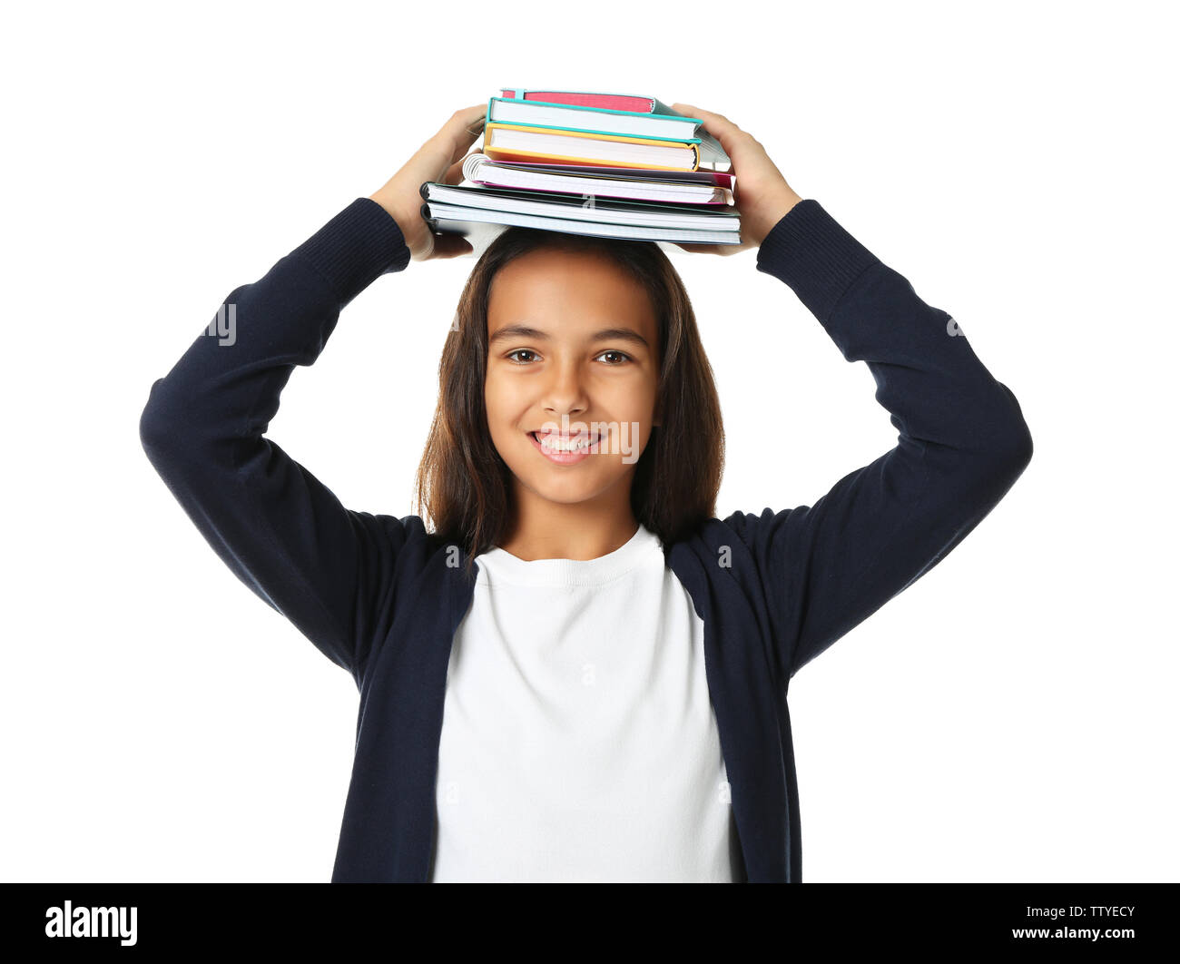 Cute schoolgirl with books and notepads on white background Stock Photo ...