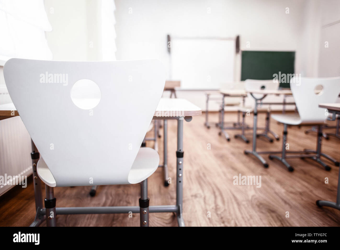 Empty White Classroom Background with Green Chalkboard Table and Seat on  Wooden Floor. Education and Back To School Concept Stock Illustration -  Illustration of education, classroom: 220056564