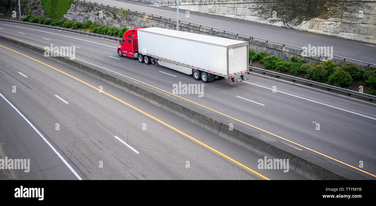 Bright red classic iconic American big rig long haul professional ...