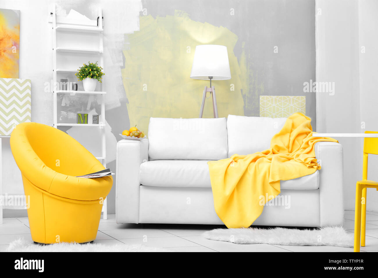 Modern living room with sofa and armchair Stock Photo - Alamy