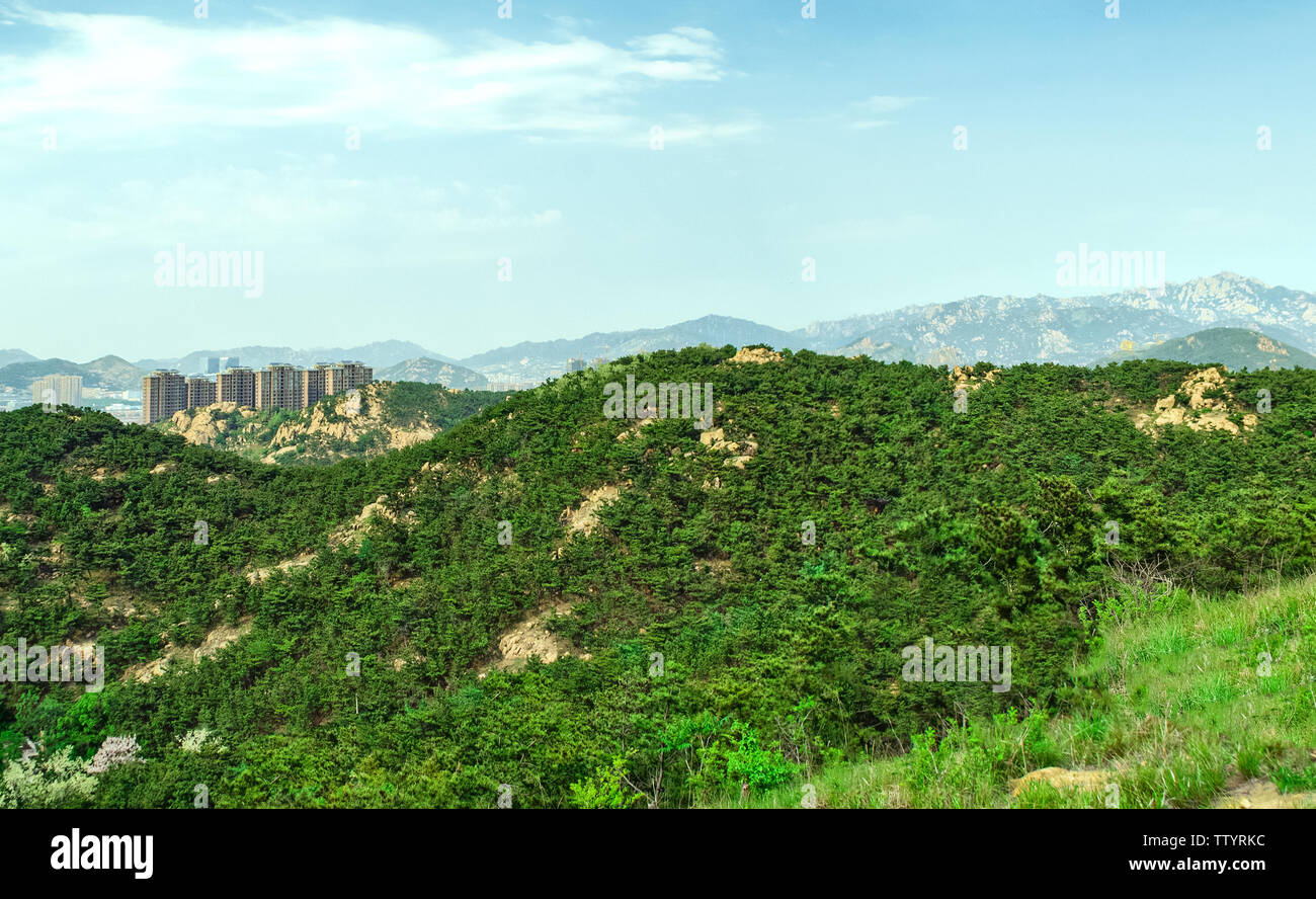 The beautiful natural scenery of Laoshan District, Qingdao, there is a residential building Stock Photo