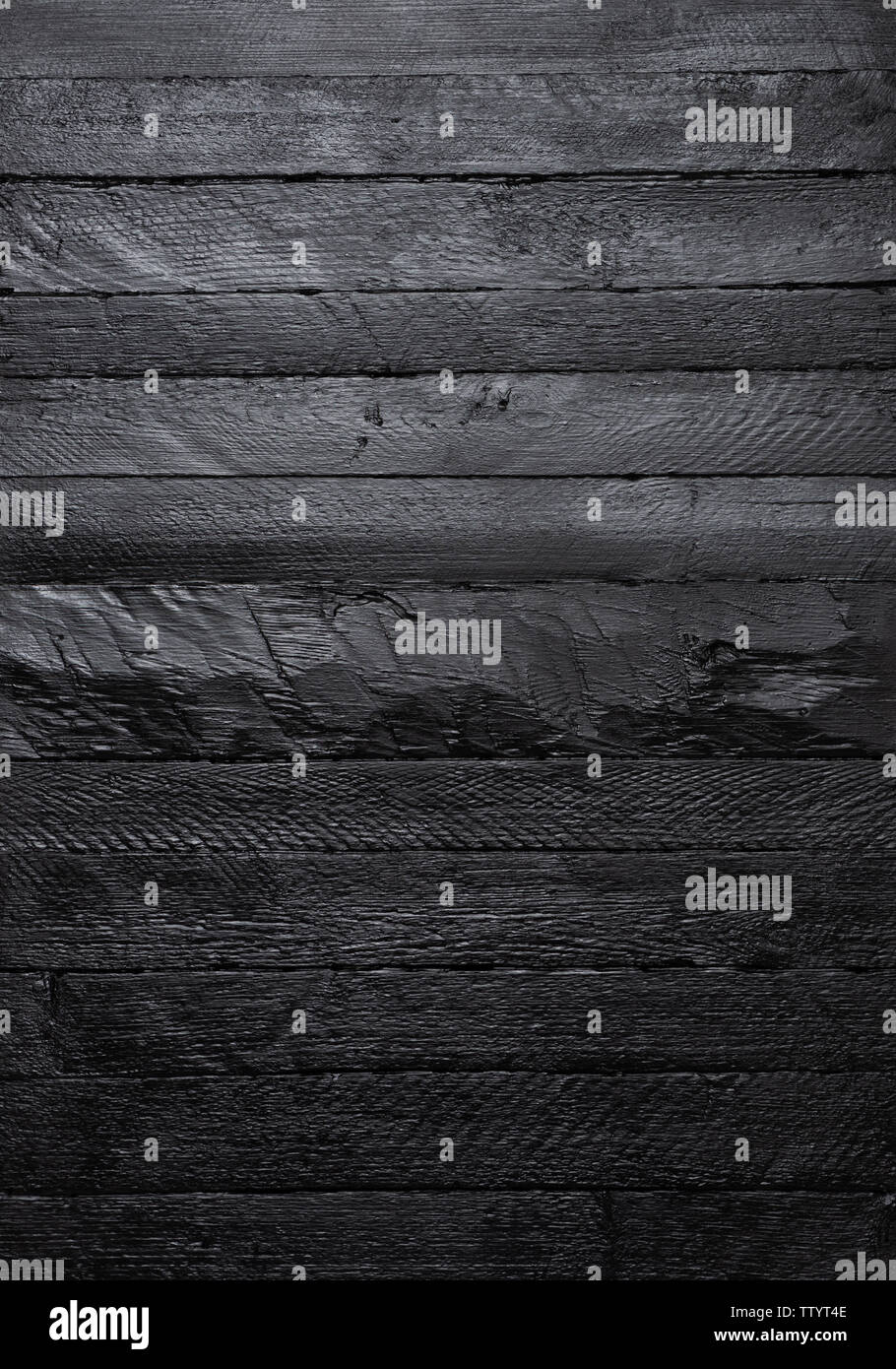 Black wood texture vertical wall background top view. Stock Photo