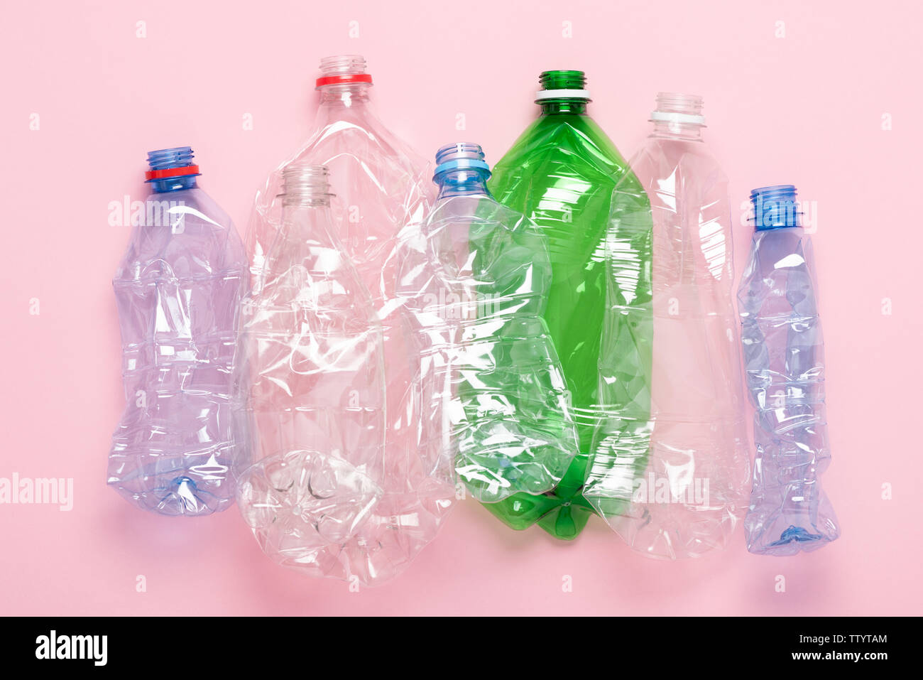 Plastic waste bottles top view. Eco plastic recycling concept. Stock Photo
