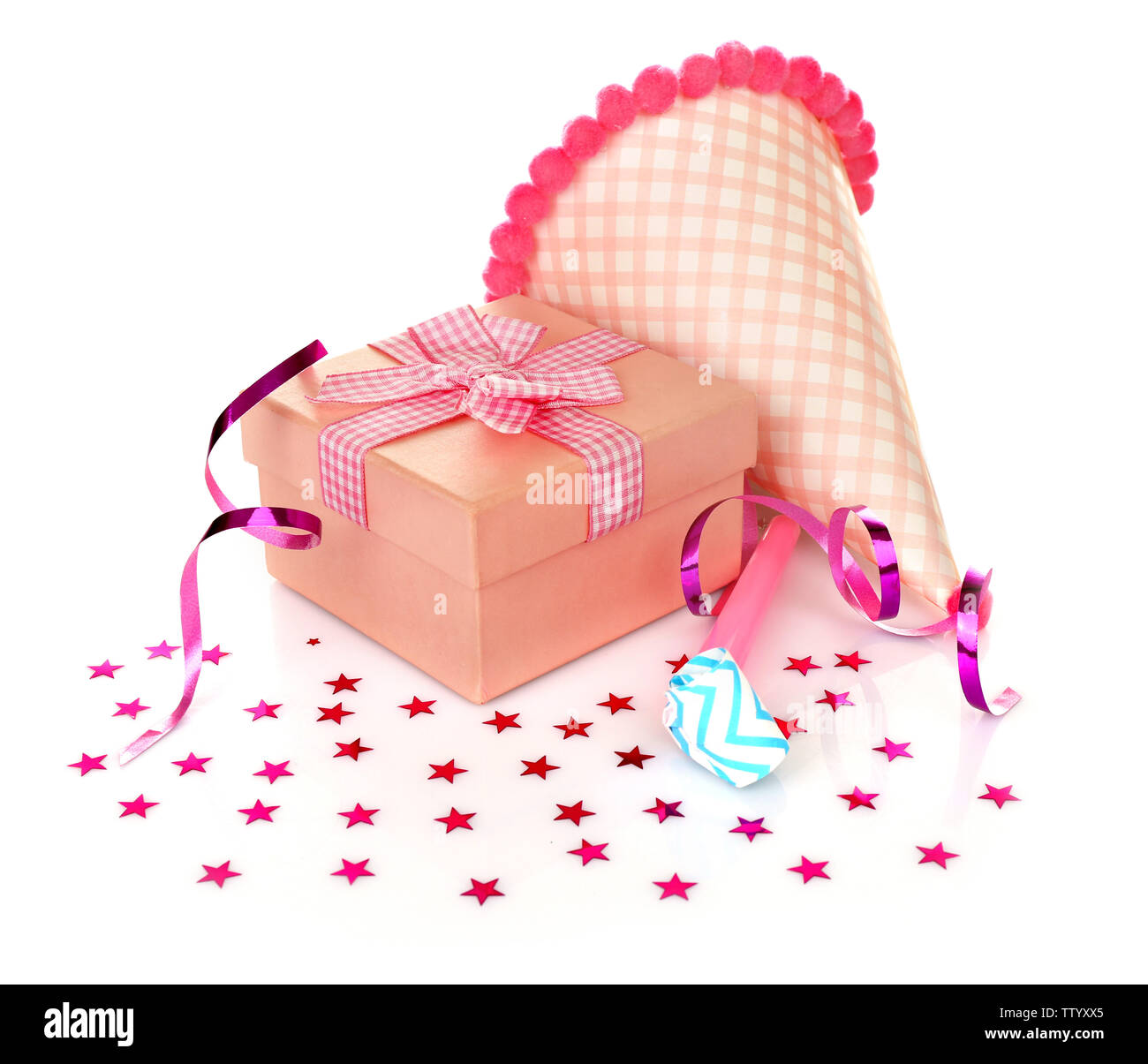 Party hat and colorful confetti on white background Stock Photo - Alamy