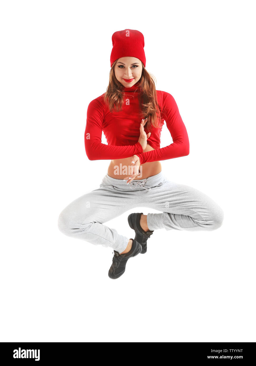 Hip hop dancer dancing on white background Stock Photo - Alamy
