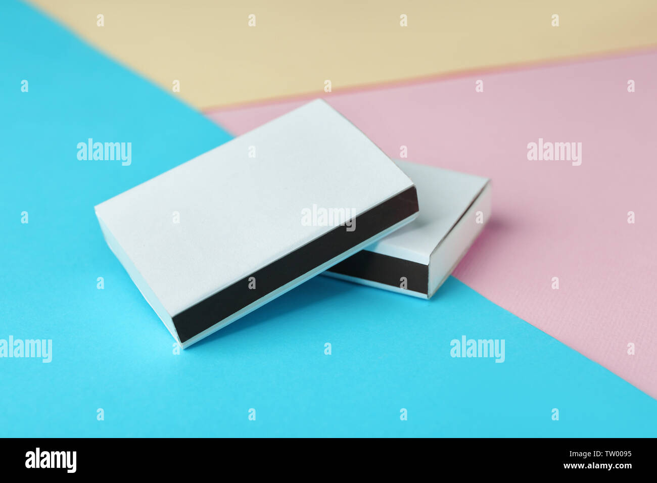 Blank match boxes on color paper background Stock Photo Alamy