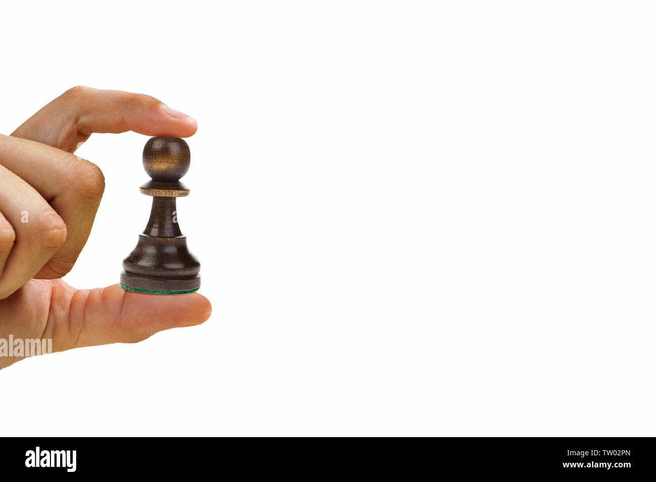 Close up of a man showing a chess piece Stock Photo