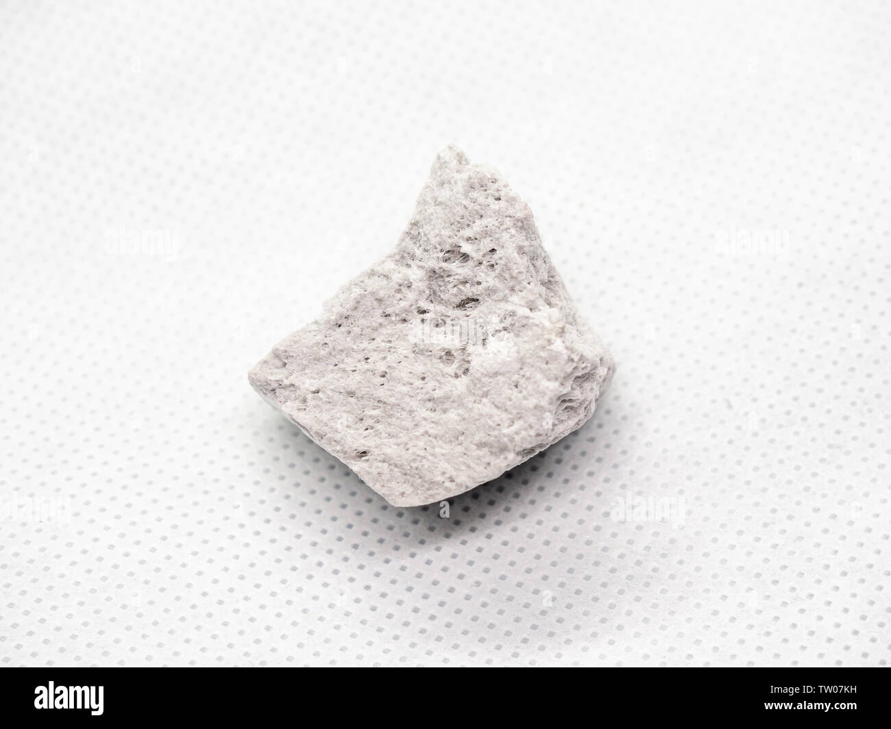 Geological specimen of natural white Pumice (pumicite, volcanic rock) on white background Stock Photo