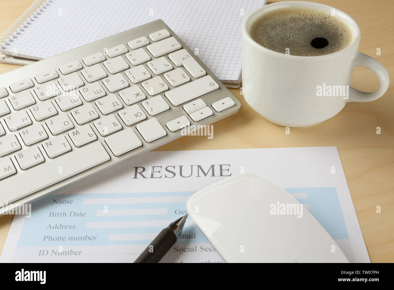 Resume form keyboard and cup of - Resume Form Keyboard And Cup Of Coffee On Wooden Table Closeup TW07PH 