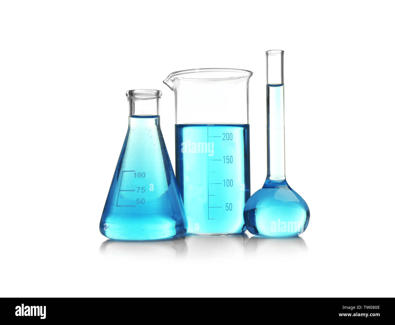 Laboratory glassware with blue samples on white background Stock Photo ...