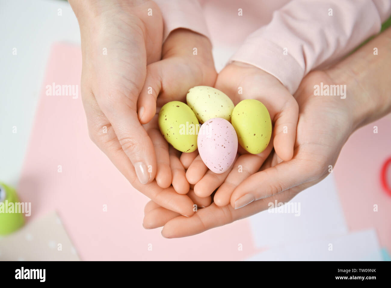 Mother and daughter holding decorated Easter eggs Stock Photo