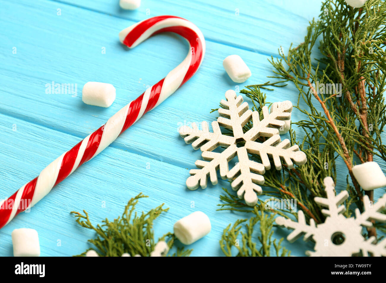 Christmas Decoration With Candy Cane On Blue Wooden Background