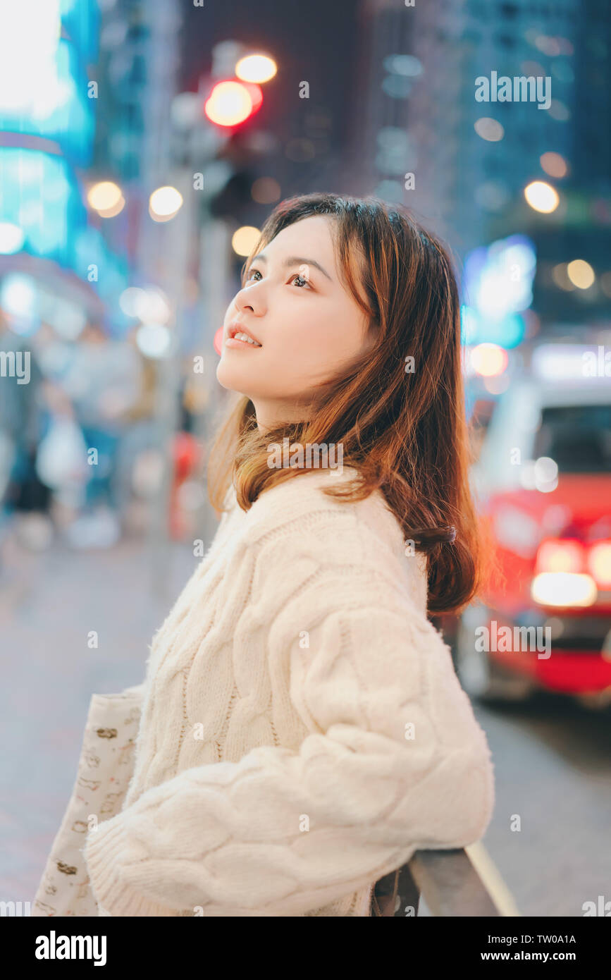 A portrait of a night girl on the streets of Hong Kong Stock Photo - Alamy