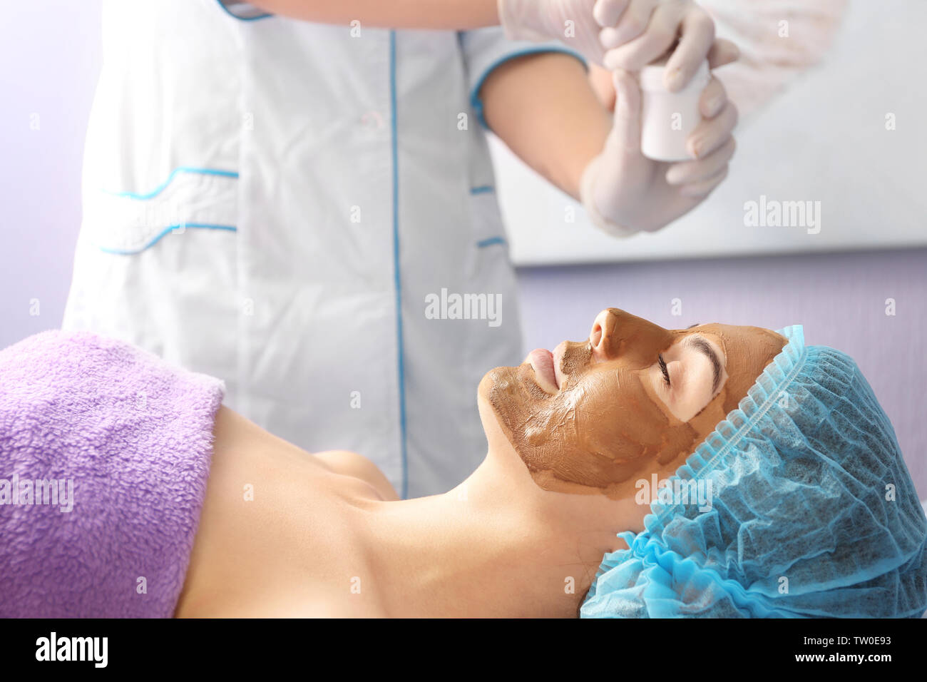Young woman having beauty treatments in salon Stock Photo
