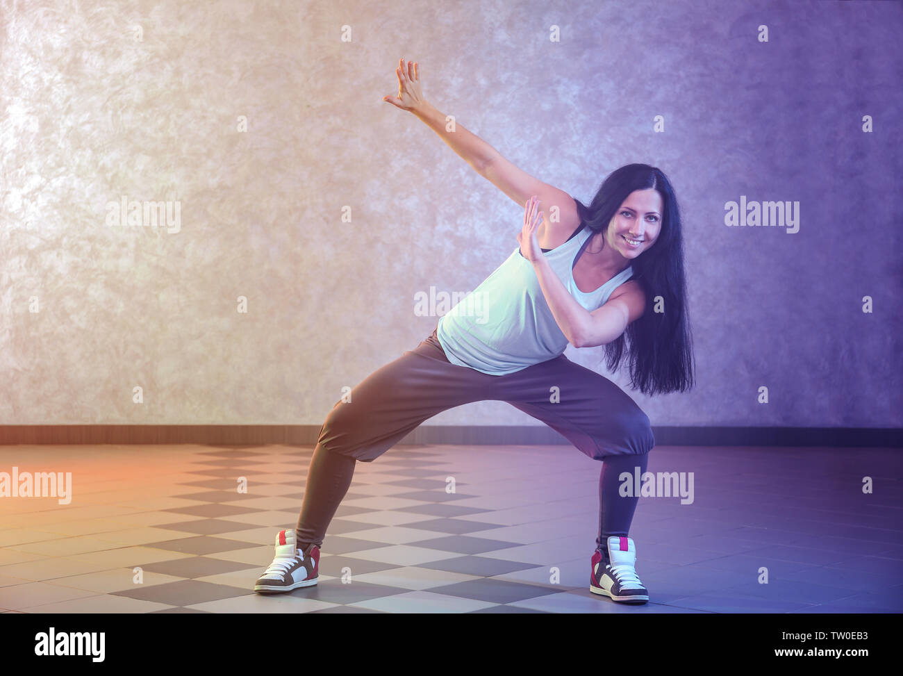Beautiful young hip-hop dancer in studio Stock Photo - Alamy