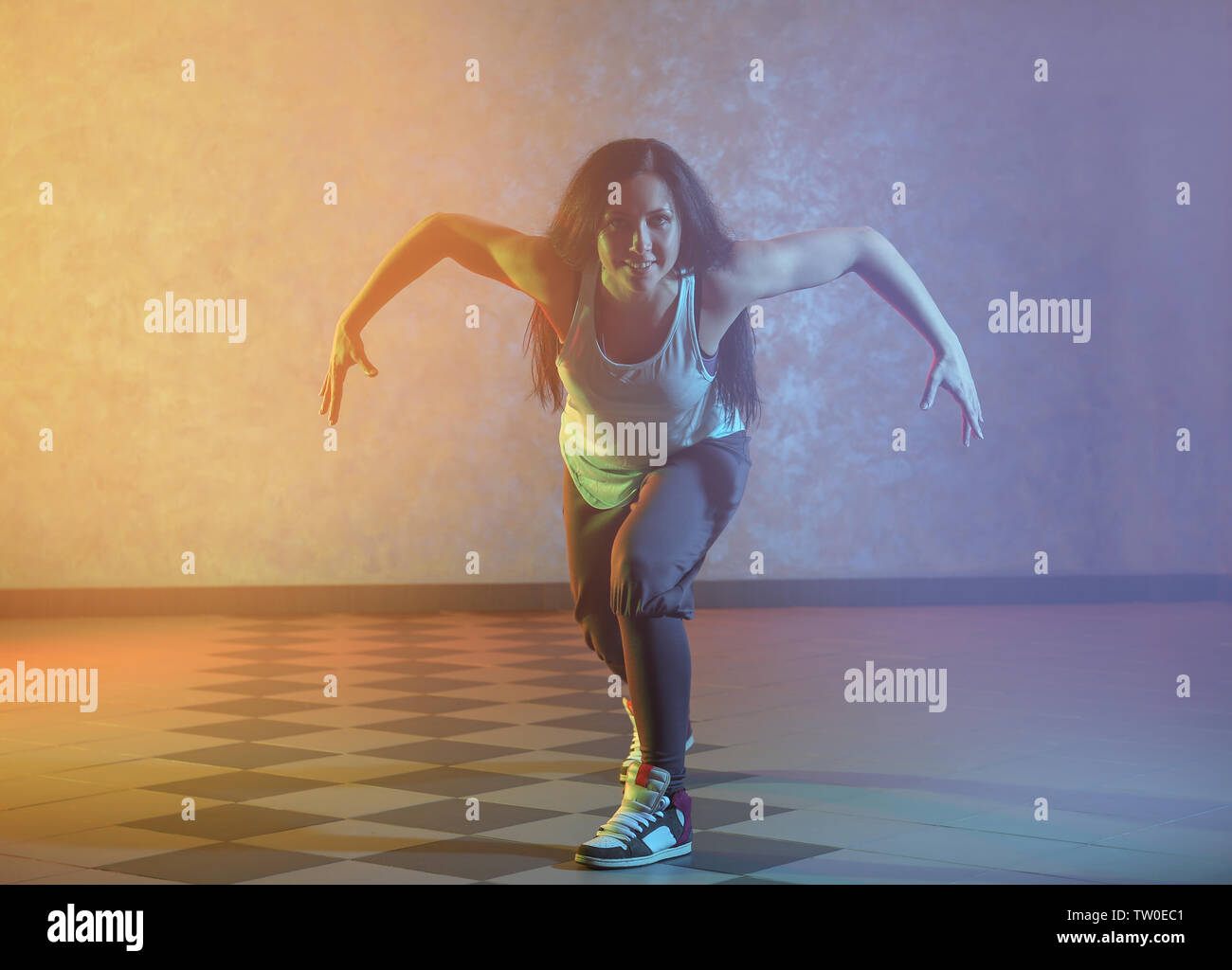 Beautiful young hip-hop dancer in studio Stock Photo - Alamy